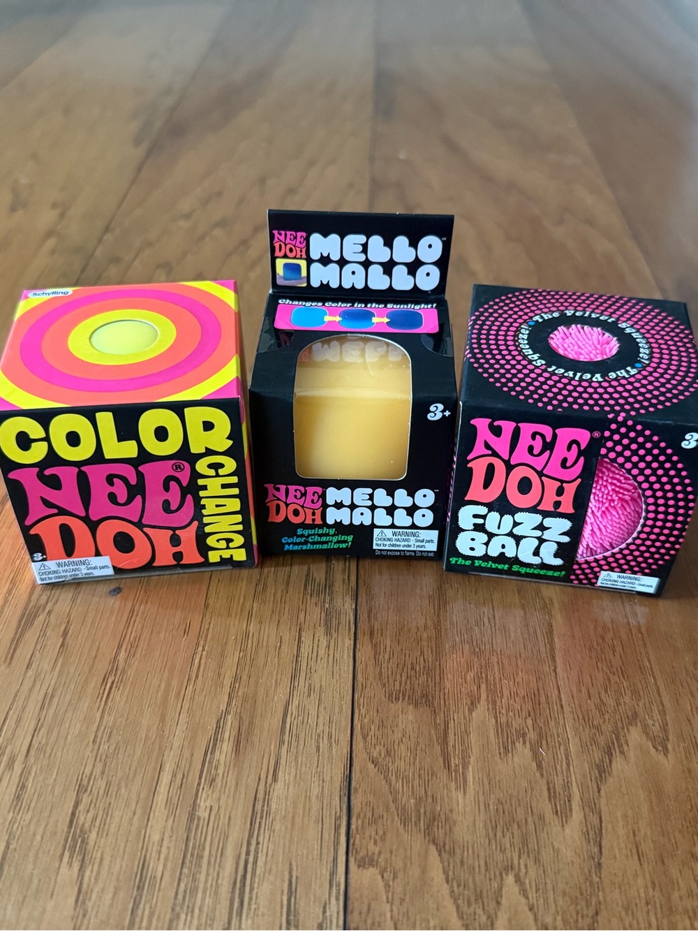 NeeDoh bundle. MelloMallo Yellow, color change yellow & fuzz ball pink.